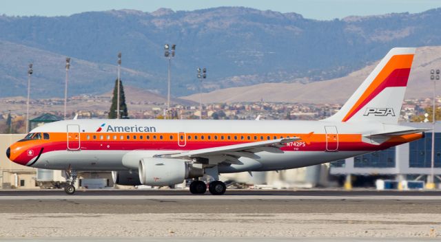 Airbus A319 (N742PS) - AALs N742PS, the Pacific Southwest Airlines heritage special livery A319 that was recently repainted and retitled and is now displaying the "American" brand instead of the former "US Airways" nameplate, accelerates down runway 16R to begin a midmorning flight to Phoenix.