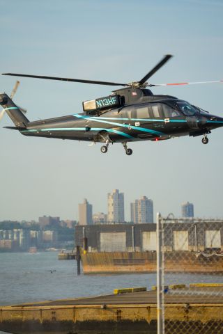 Sikorsky S-76 (N13HF) - Captured several helicopters, including this one, while walking on the west side of New York City.  