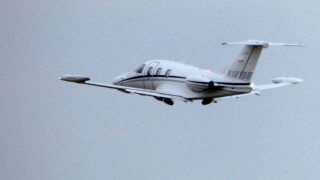 Eclipse 500 (N161BB) - Wheels just about retracted for this departing 2008 Eclipse 500 in the Spring of 2019.