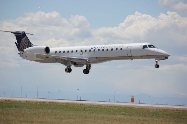 Embraer EMB-145XR (N24103) - Landing on 35L.