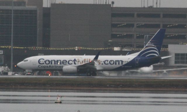 Boeing 737-800 (HP-1849CMP) - Copa in new Copa Connect Miles.com Special livery departs in heavy rain/fog back to Panama City.  