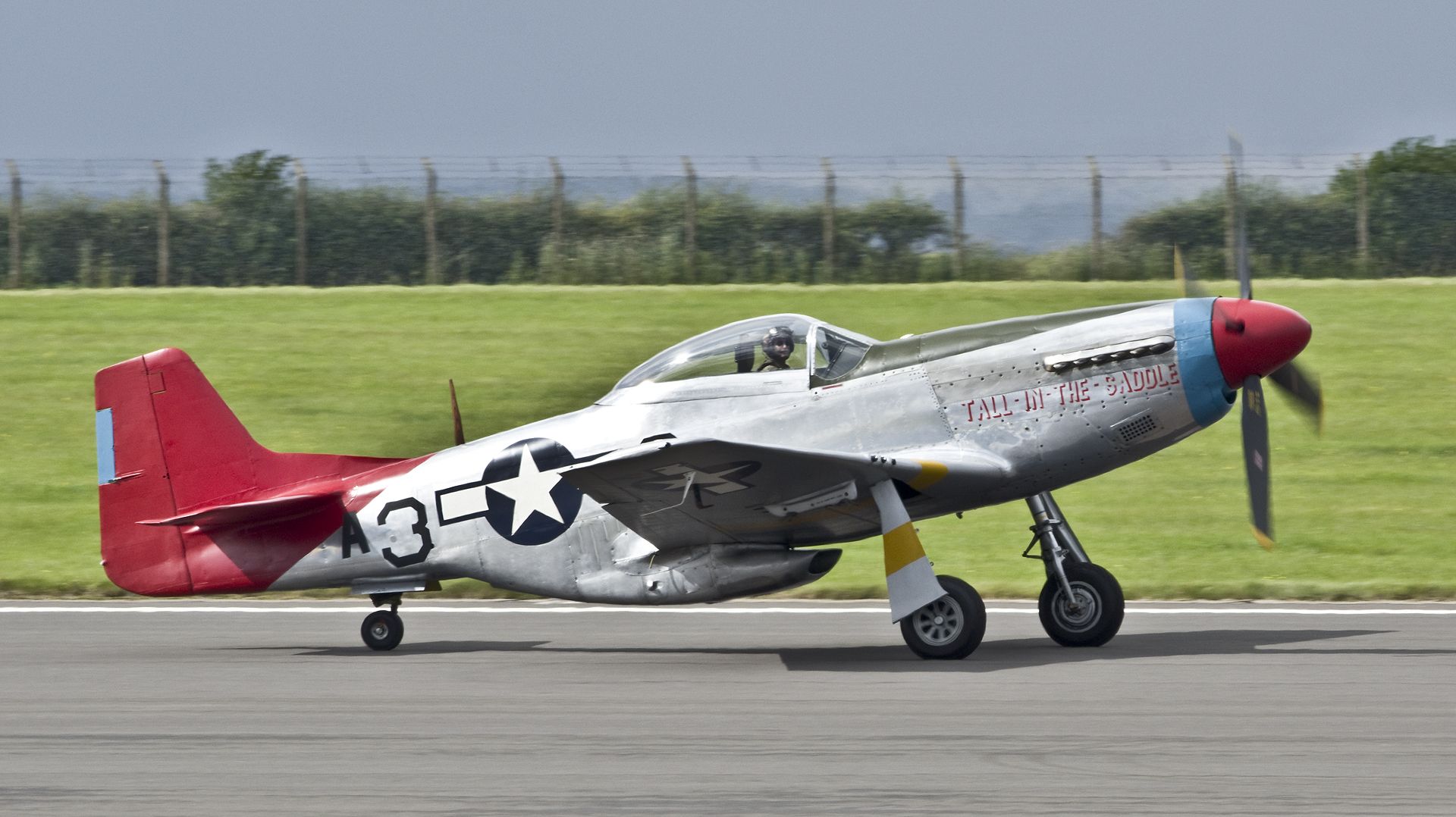 North American P-51 Mustang (G-SIJJ) - North American P-51D Mustang ‘A3-3’ “Tall-In-The-Saddle” (G-SIJJ).Full US military serial 44-72035.&lt;br&gt;Repainted for the 2016 season, this very original P-51 now wears her own genuine ‘Red Tail’ 332nd Fighter Group markings and is believed to be the only Mustang to have served with the group which currently remains airworthy. RAF Scampton 9th September 2017