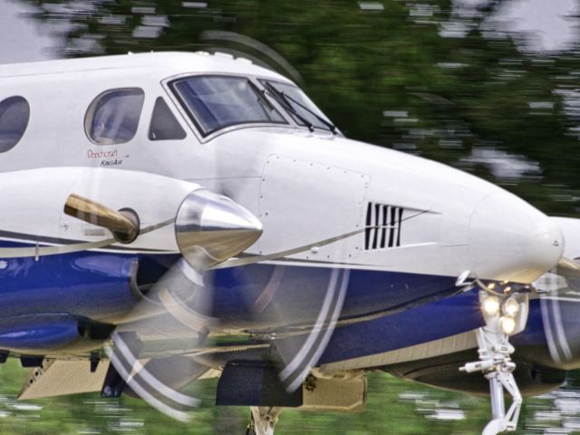 — — - King Air at Roche Harbor, WA on short final, captured with a 400mm lens.