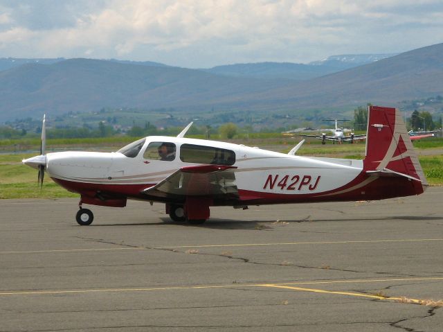 Mooney M-20 Turbo (N42PJ) - Departing Yakima outbound for Bismark, ND.