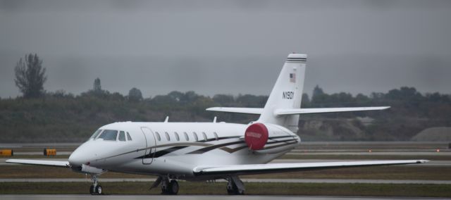 Cessna Citation Sovereign (N1901) - On the ground at APF on 02/11/11.  A rainy day.