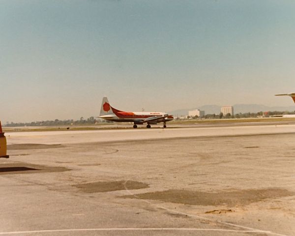 — — - Aspen Air Convair ready for take off spring 1977