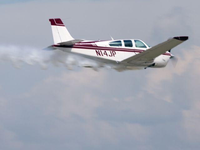 Beechcraft Bonanza (33) (N14JP) - Oshkosh 2013!