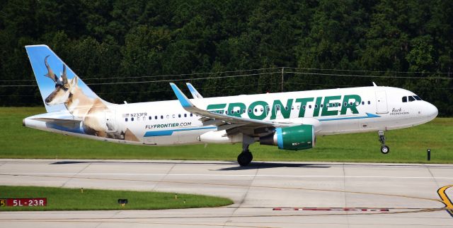 Airbus A320 (N233FR) - Buck the Pronghorn rotating off of 5L.  From the RDU observation deck, 9/29/18.