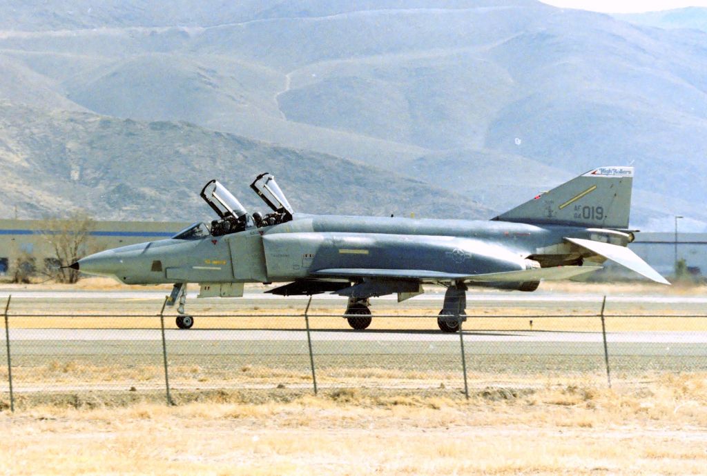 McDonnell Douglas F-4 Phantom 2 (64-1019) - KRNO - NVANG F-4 "High Rollers" on taxi back to the Air Guard Ramp in this June 1990-91 view from the Airpark. Love this classic view of both canopies open on taxi - Gman may have to help on the reg,,,,,please?