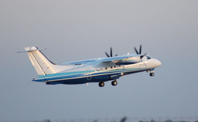 Fairchild Dornier 328 (10-3026) - 022414  C146 from SOCOM playing on Rwy 19R.