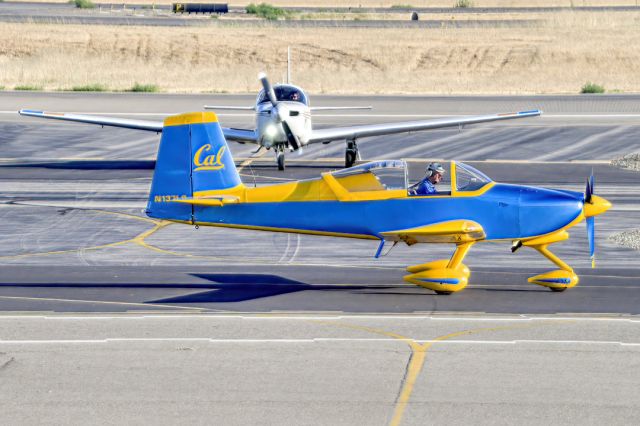 Vans RV-9 (N137LC) - Collins Leland F Van's RV9 passes by Mooney M20J at Livermore Municipal Airport (CA). July 2021