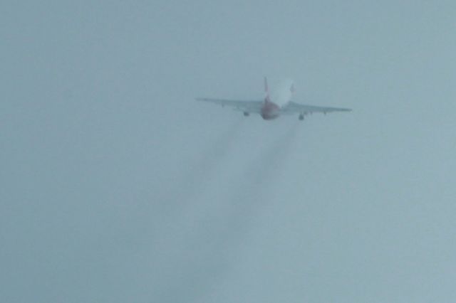 Boeing 737-200 (N321DL) - In the clouds