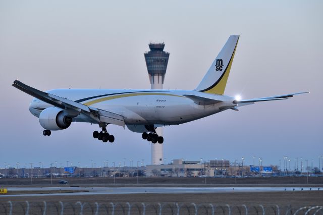 BOEING 777-200LR (N707GT) - 5-L 02-03-24 at dusk.