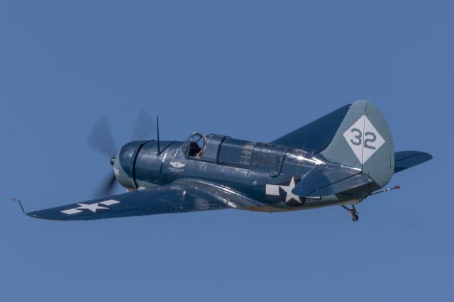 — — - SB2C-5 Helldiver aircraft in flight at Houston Executive Airport in April 2019. This is the only flying example of this aircraft type in the world.