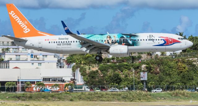 Boeing 737-800 (C-FEVD) - Sunwing Airlines C-FEVD landing at TNCM St Maarten.