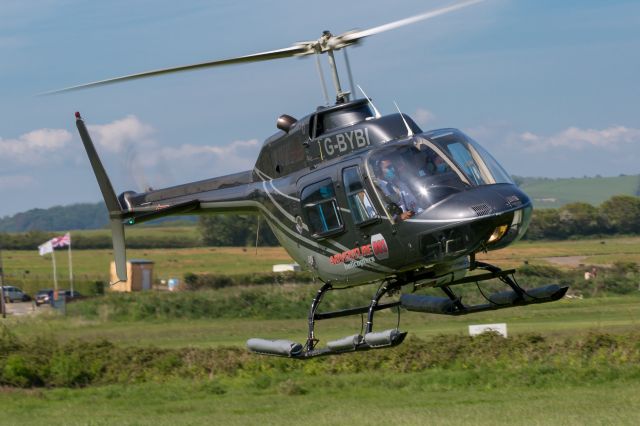 G-BYBI — - Bell 206B Jet Ranger landing at EGHN Isle of Wight Airport at Sandown