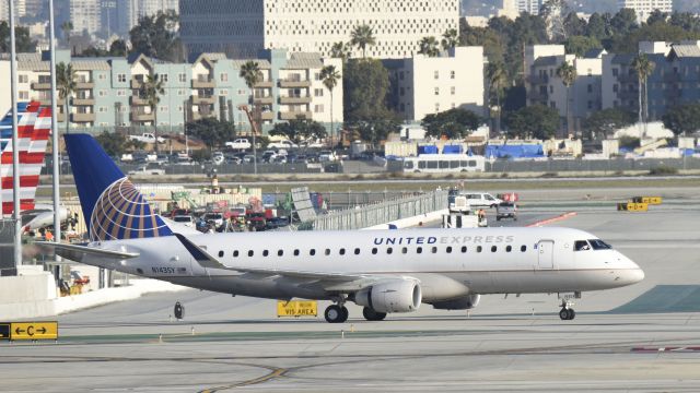 Embraer 175 (N143SY) - Taxiing to gate at LAX