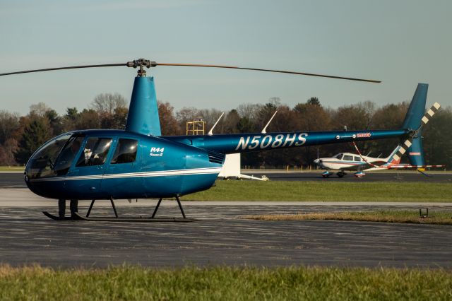 Robinson R-44 (N508HS) - picture was taken thru fence