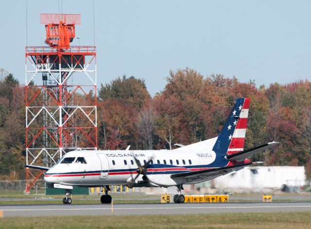 Saab 340 (N203CJ) - Landing RW28.