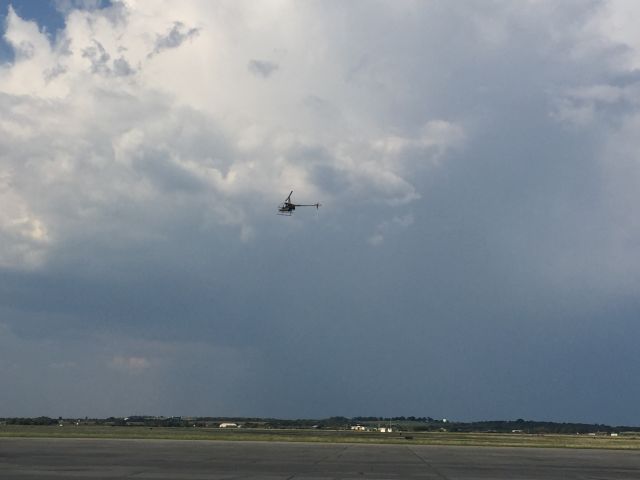 Robinson R-22 — - Little helicopter, big storm!