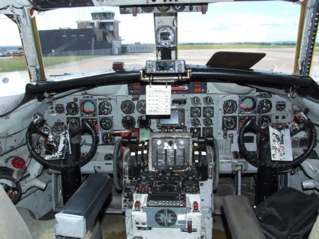 — — - The cockpit view of the CV 580 old school controls hands on flying.