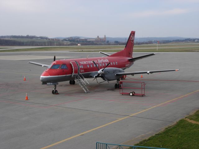 Saab 340 (N445XJ) - Waiting for passengers in Latrobe Pennsylvania in Spring of 2006.