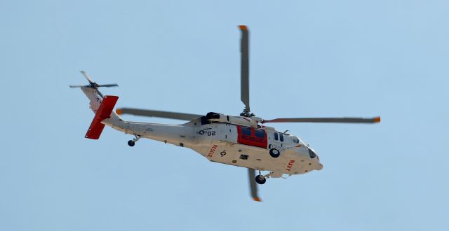 Sikorsky S-70 (16-5760) - Didn't recognize this one when it went over our heads. When I got back home I looked in my log to see if I had ever snapped this one previously ... and there it was. But the last time I clicked it the entire "front end" was black.br /The Fallon-based "Longhorns" SAR unit is still flying this MH-60S Seahawk (165760) but it has been somewhat repainted. Here it passes over us as it departs on the 2 minute return flight from KFLX to NAS Fallon (KNFL).