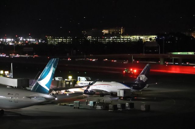 Boeing 737-800 (XA-ADU) - KSFO - Aeromexico 737- at the International Terminal along side Cathay Pacific A350 B-LRK. The fire rig was returning from an incident next to an Avianca Airbus and a jetBlue Airbus parked in the remote slot out of view to the right. I was surprised at how many red lights the Fire rig had all around the truck. Boeing CN:61799 LN:6591br /Type 737-852br /First flight date 13/09/2017br /This photo March 9th, 2018.