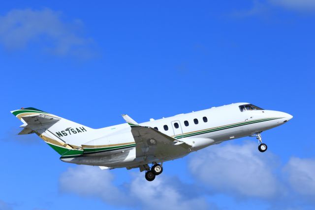 Hawker 800 (N676AH) - Private N676AH departing TNCM St Maarten