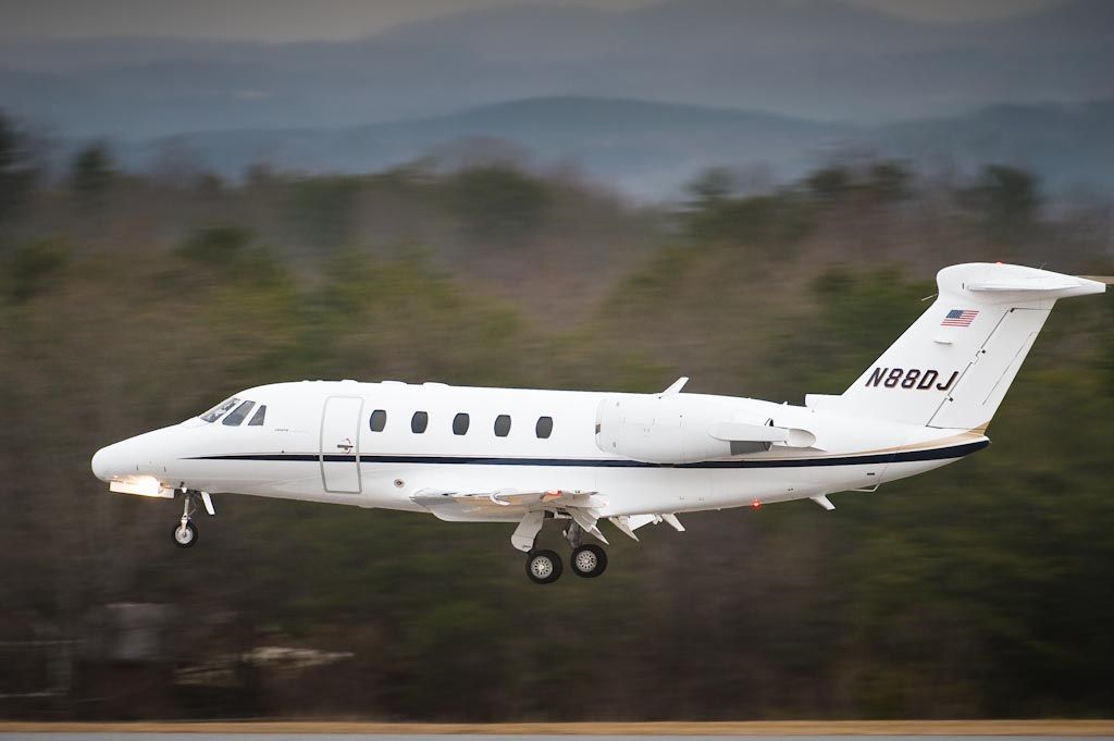 Cessna Citation III (N88DJ) - 29_Jan_2010. Arriving on 24 as light snow & the Arctic blast rolls into Hickory.