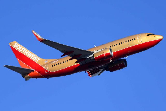 Boeing 737-700 (N792S) - Southwest Boeing 737-7H4s N792SW on December 22, 2014. It first flew on December 12, 2000. Its construction number is 27887. It was delivered to Southwest on December 21, 2000. Southwest operates three 737s in retro gold livery. 