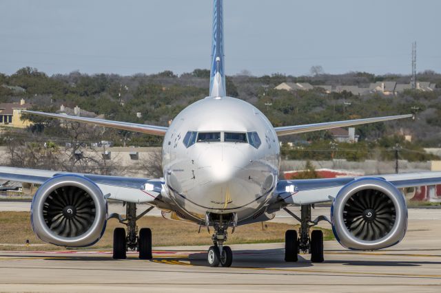 Boeing 737 MAX 8 (N37295) - Exiting 31L