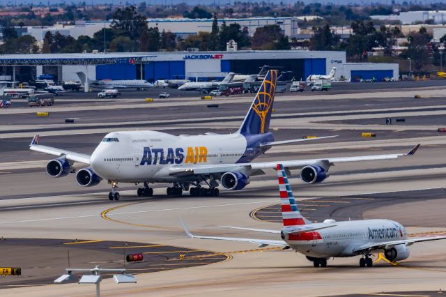 Boeing 747-400 (N481MC) - An Atlas Air 747-400 taking off from PHX on 2/13/23, the busiest day in PHX history, during the Super Bowl rush. Taken with a Canon R7 and Canon EF 100-400 II L lens.