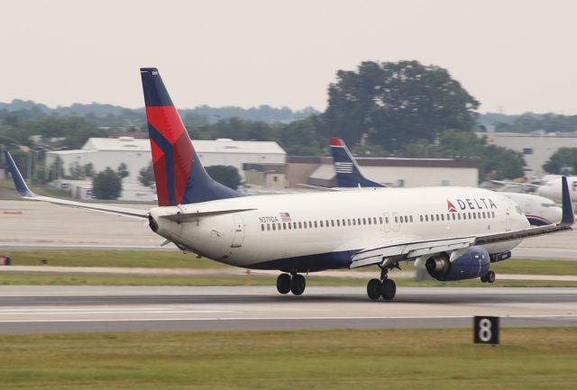 Boeing 737-800 (N379DA) - Right before touching down.