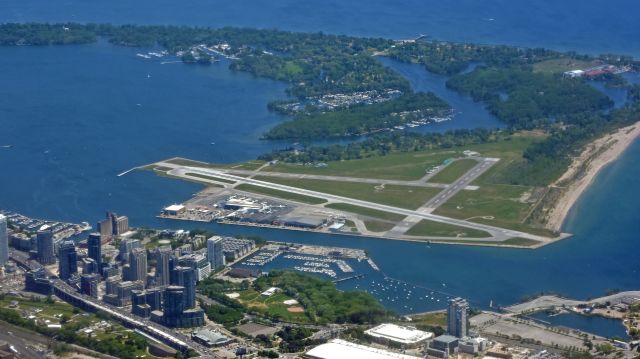 — — - View from a CRJ200 approaching CYYZ with a nice view of CYTZ on 5/31/2016.