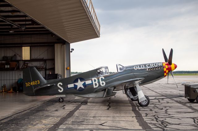 North American P-51 Mustang (N551E) - P-51B "Old Crow" getting pushed back into the Roush hanger after a flight around the Detroit Area.