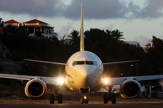 Boeing 737-800 (9Y-JME) - Air Jamaica - Caribbean Airlines 9Y-JME. Eye to Eye with the Spirit of Montego as shes about to depart St. Maarten. Courtesy Jose Mendez ©