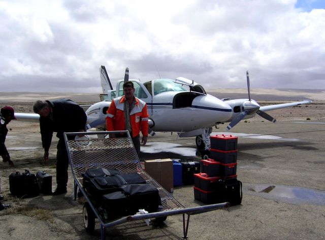 Beechcraft Baron (58) (ZS-MDJ) - At Alexander Bay after a long flight from Johannesburg.