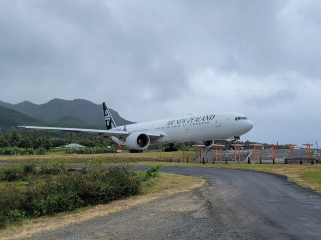 BOEING 777-300 (ZK-OKN) - ANZ 945 creeps down the runway at Rarotonga International Airport in preparation for an unusual east to west departure.