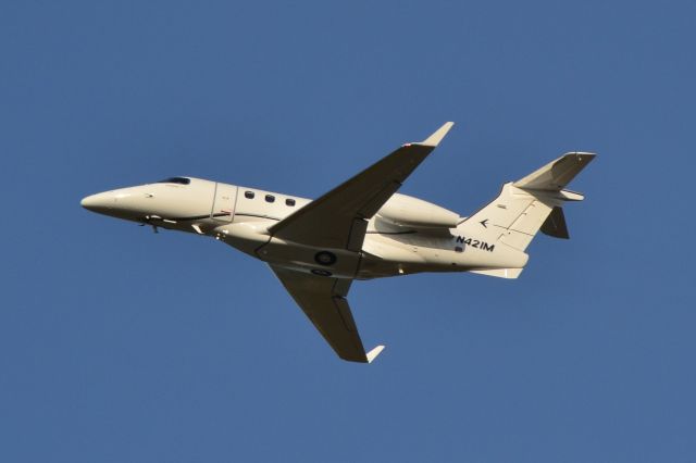 Embraer Phenom 300 (N421M) - BILTMARK TRANSPORTATION INC (Tribute Companies, Inc.) departing runway 17 at KILM - 4/27/21