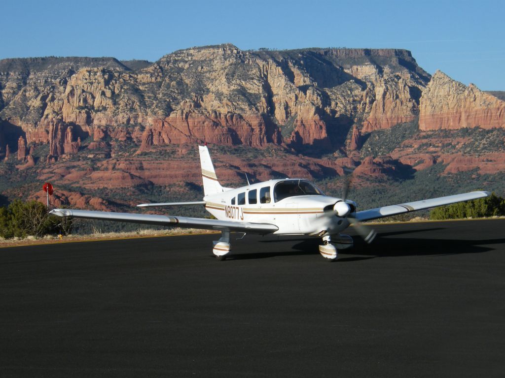 Piper Saratoga (N8077J) - At Sedona, AZ, atop the mesa airport at the northern end of the runway.