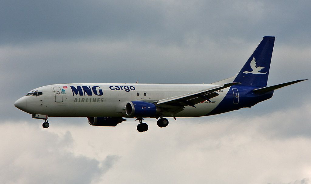 Boeing 737-700 (TC-MCF) - Bad light, bad weather sorry for the quality. That Aircargo Plane is very rare, mostly in the Night in Action....