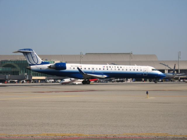 Canadair Regional Jet CRJ-700 (N773SK) - Holding on RWY 19R