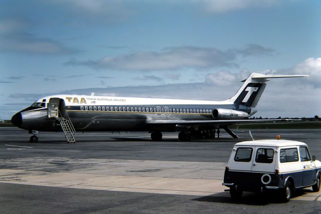 BELL-AGUSTA AB-139 (VH-TJK) - TRANS AUSTRALIA AIRLINES - McDONNELL DOUGLAS DC-9-31 - REG : VH-TJK (CN 47008/98) - ADELAIDE INTERNATIONAL AIRPORT SA. AUSTRALIA - YPAD 4/4/1975 35MM SLIDE CONVERSION USING A LIGHTBOX AND A NIKON L810 DIGITAL CAMERA IN THE MACRO MODE.