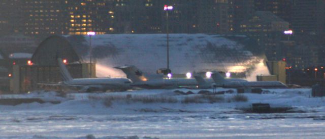 Boeing 757-200 (N801DM) - Dallas Mavericks B757 next to San Jose Sharks B727 at night.