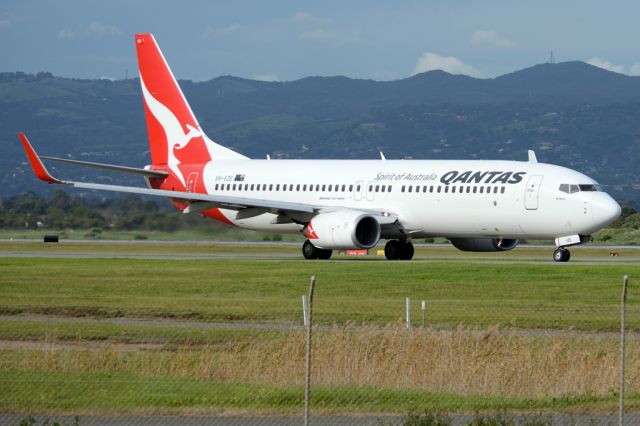 Boeing 737-800 (VH-VZE) - On taxiway heading for take-off on runway 05. Thursday, 19 June 2014.