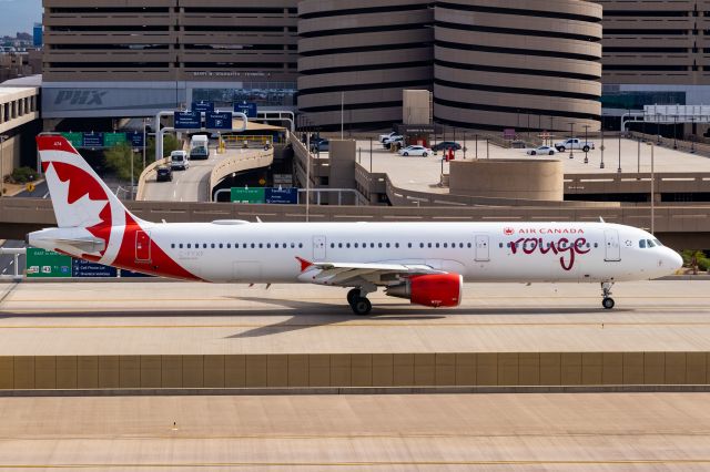 Airbus A321 (C-FYXF) - Air Canada Rouge A321 taxiing at PHX on 11/1/22. Taken with a Canon 850D and Tamron 70-200 G2 lens.