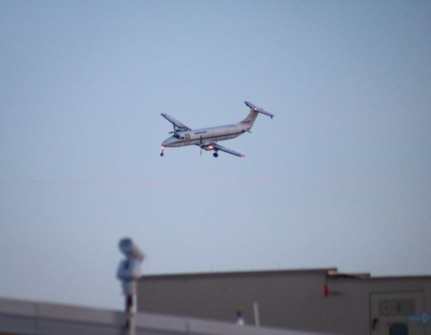 Beechcraft 1900 (N1568G) - Sharp turn approach into 34R