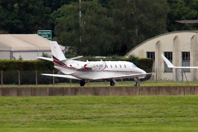 Cessna Citation Excel/XLS (G-NJAB) - NetJets UK Citation XLS parked on the ramp on 11-Jun-21 one day after arriving from EGPE as NJU899B.