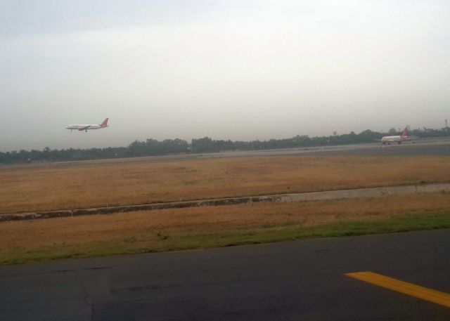 — — - One landing, another one ready to take off...